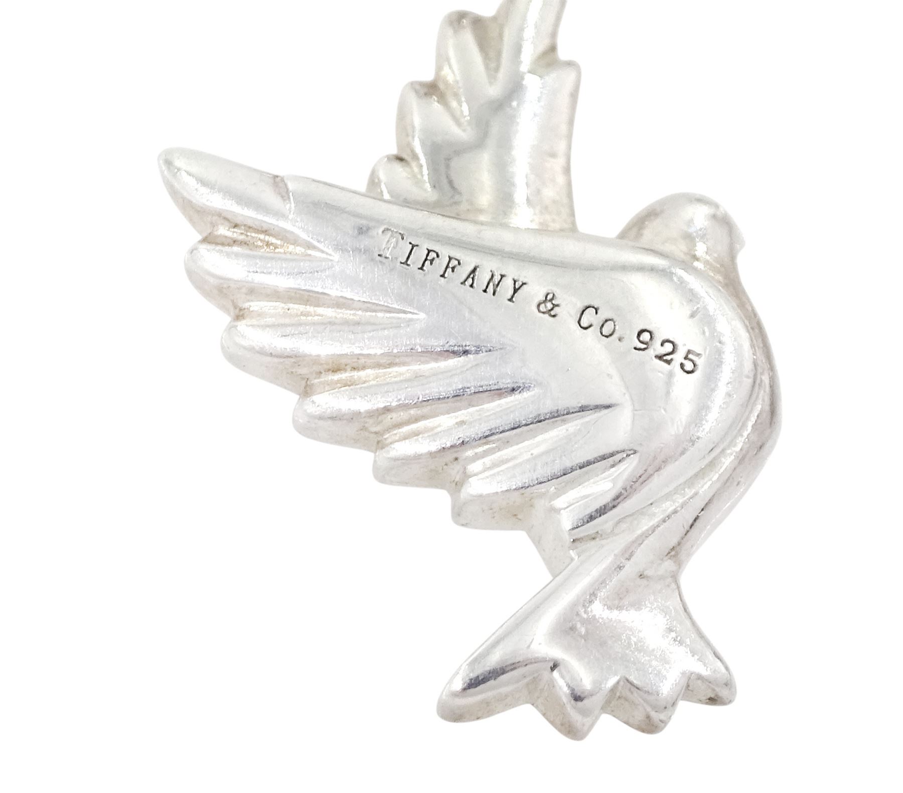 Tiffany & Co two pairs of silver stud earrings including pendant dove earrings designed by Paloma Picasso and heart earrings designed by Elsa Peretti