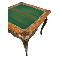 20th century French walnut and Kingwood card table, shaped fold-over top with figured quarter-matched veneers and floral egg and dart moulded edge in gilt metal, shaped aprons decorated with shell motifs with extending foliage, pull-out action base revealing storage well, on cabriole supports with ornate gilt metal mounts 