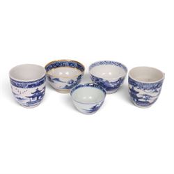 18th century Chinese blue and white ‘Nanking Cargo’ tea bowl and saucer, painted with pagoda in a landscape, with Christie's lot label No 5110, together with another tea bowl with similar decoration and gilt detail and other blue and white