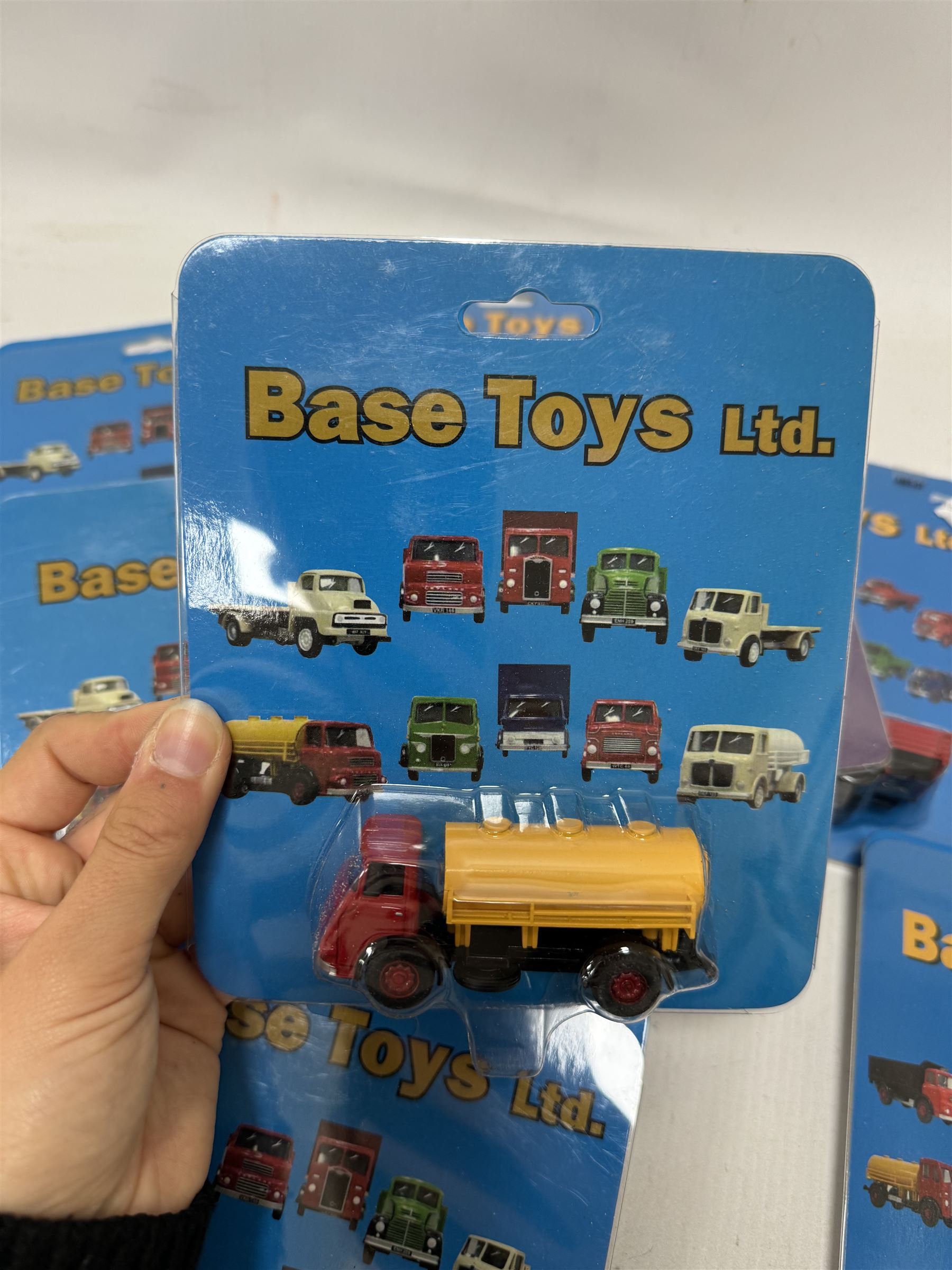 Twenty one Base Toys 1:76 scale diecast vehicles, all in original blister packs