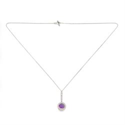 Early 20th century white gold silver amethyst and diamond pendant, round cut amethyst, surrounded by seventeen old cut diamonds, suspending from a five stone diamond set bail, to a silver chain necklace, total diamond weight approx 0.40 carat