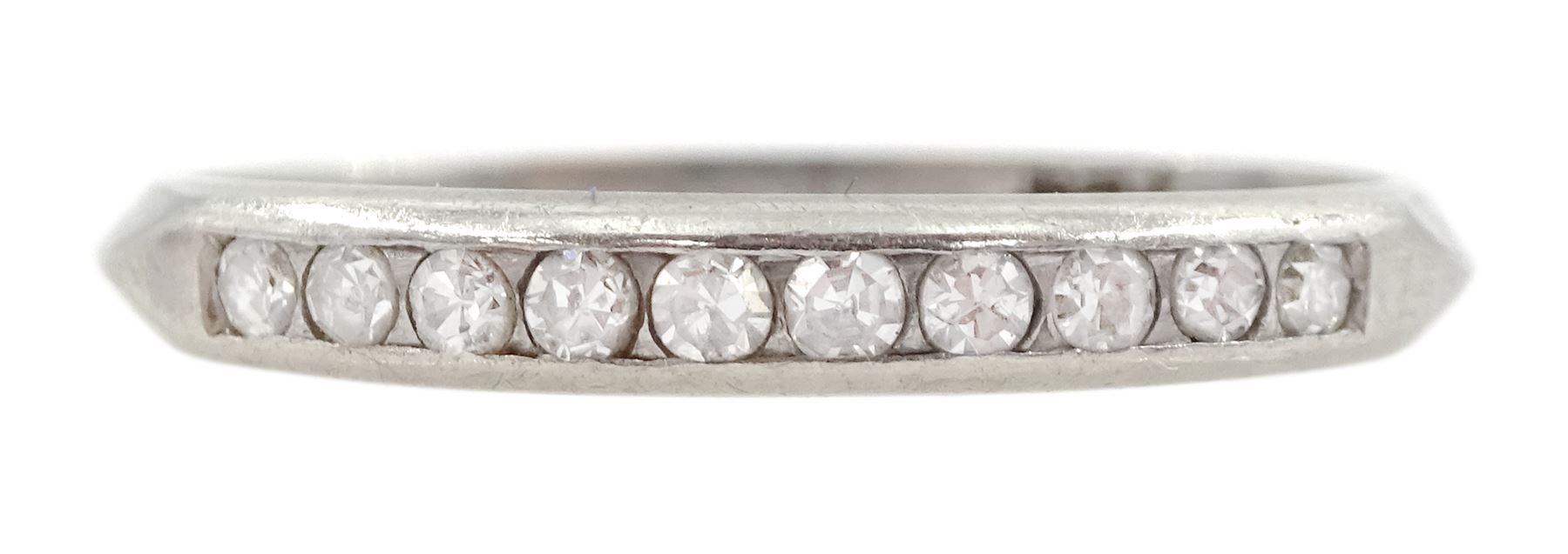 Early 20th century platinum channel set old cut diamond half eternity ring, stamped Plat, boxed