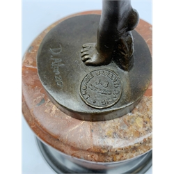 An Art Deco style bronze after D Alonzo, modelled as a female hoop dancer, with impressed mark and foundry mark, raised upon a cylindrical marble base, overall H47cm. 