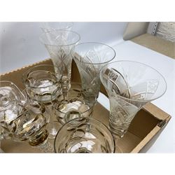 Set of four glasses, the trumpet form bowls with cut hobstar decoration, together with set of six gilt glasses with twisted stem, cut bowl with metal rim etc