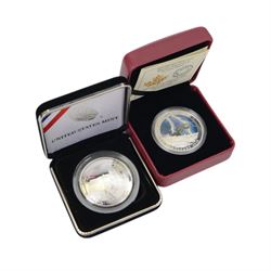 Great British and World silver coins, comprising King Charles III 2023 fine silver one ounce Britannia, Queen Elizabeth II Jersey 2015 'Churchill' silver proof five pound coin, three silver proof one pound coins, United States Mint 2019 'Apollo 11' silver proof one dollar coin, Royal Canadian Mint 2015 'Summer Storm' fine silver twenty dollar coin, Queen Victoria 1887 silver one crown coin, and London Mint 2005 'Prince of Wales and Duchess of Cornwall' prototype