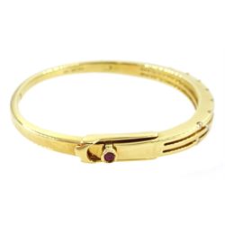 Roberto Coin 'Parisienne' 18ct gold three row round brilliant cut diamond bangle, with a signature round cut ruby to the underside and ruby set clasp, Birmingham 2006, boxed