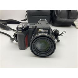 Nikon Coolpix 8700 camera body, serial no 3220838, with Zoom Nikkor Ed 8.9-71.2mm 1:2.8-4.2 lens, together with Canon digital video camcorder and other digital cameras and camera equipment
