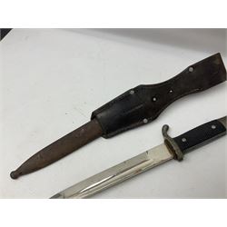 WWII German K98 (short) NCO dress bayonet, the 20cm fullered blade marked Anton Wingen Solingen to the ricasso, with chequered black grip plates; in steel scabbard with indistinctly stamped leather frog |L37cm overall