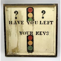 A framed 20th century hand painted metal sign, detailed with two traffic lights and inscribed 'Have you left your keys??', H61.5cm L61cm.