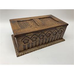 An oak keep box, with carved decoration to front and sides, H15cm L39cm D23.5cm.