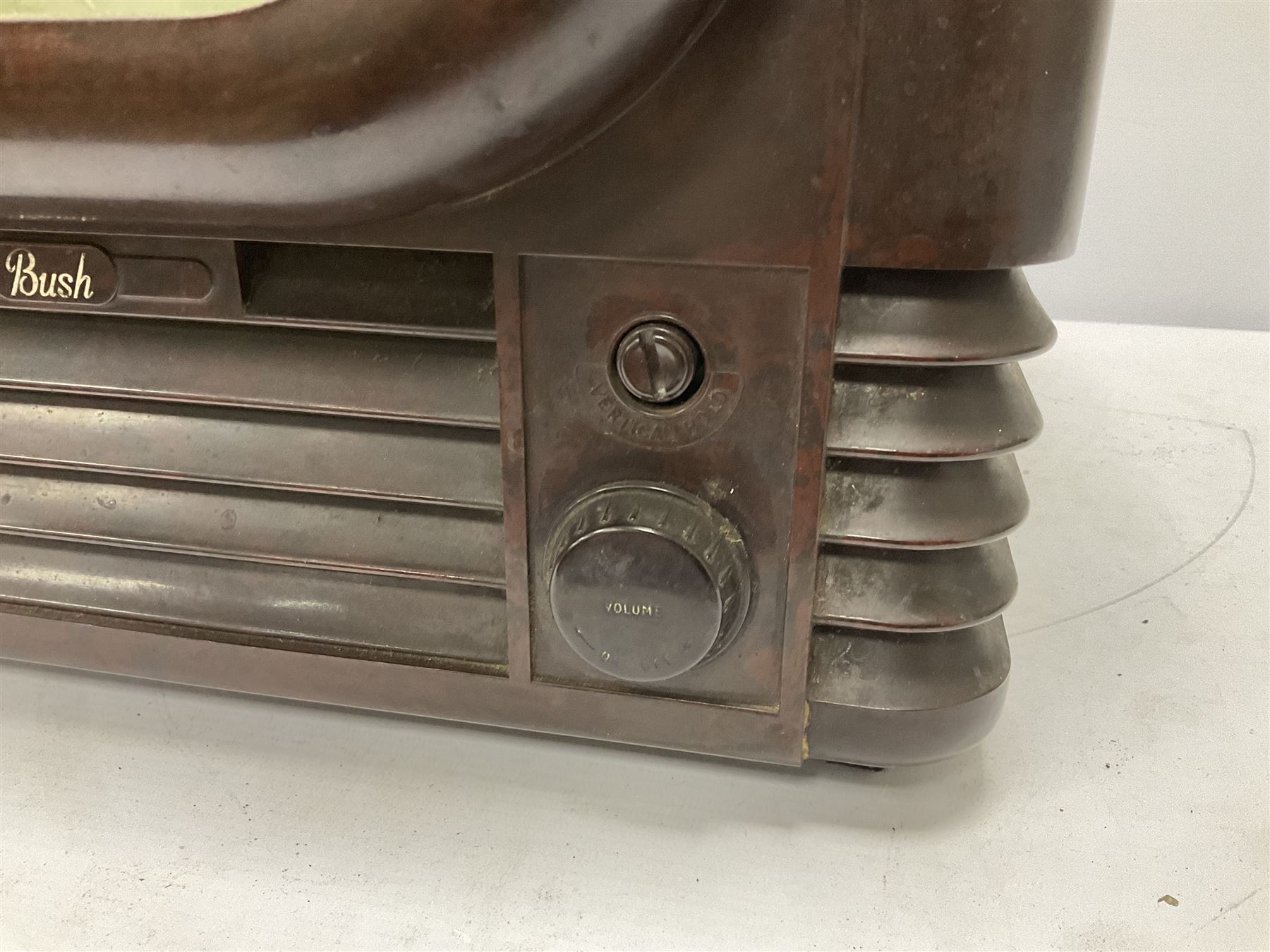 1950s Bush Type TV22 Bakelite Television receiver, the TV cased in marbled brown Bakelite of stepped form, the 9 inch screen with white mask, with original leather cover casing to reverse, H39cm D34cm W38cm