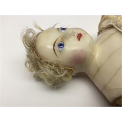 Victorian wax shoulder head doll with pale complexion, applied hair, inset glass eyes and fabric covered jointed body with kid leather lower arms; white linen dress and undergarments H50cm