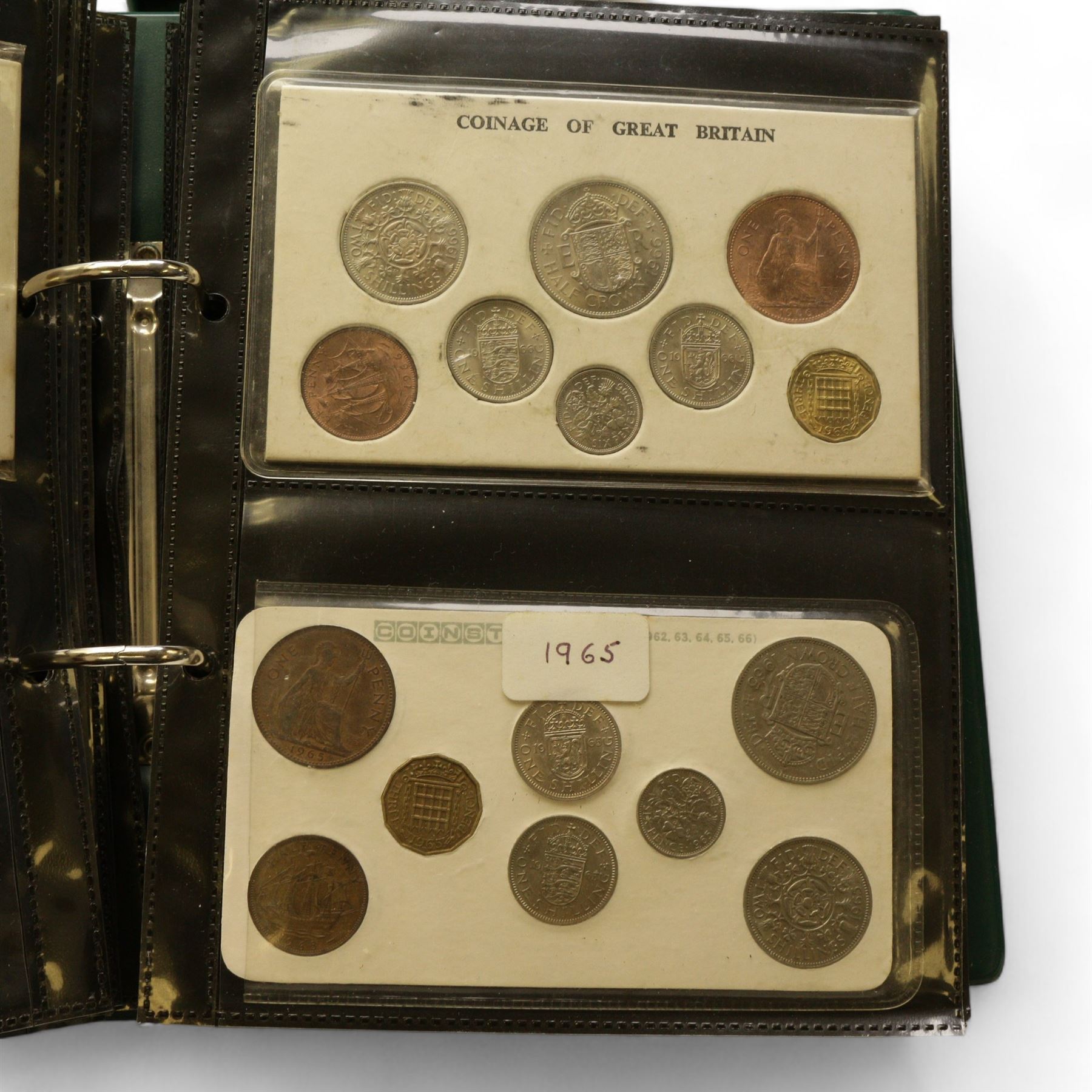 Mostly Great British coins, including various pre 1920 silver three pence pieces, pre 1947 silver sixpences and one shillings, pre-decimal coinage, commemorative crowns, unofficial year sets and part sets etc, housed in eight folders