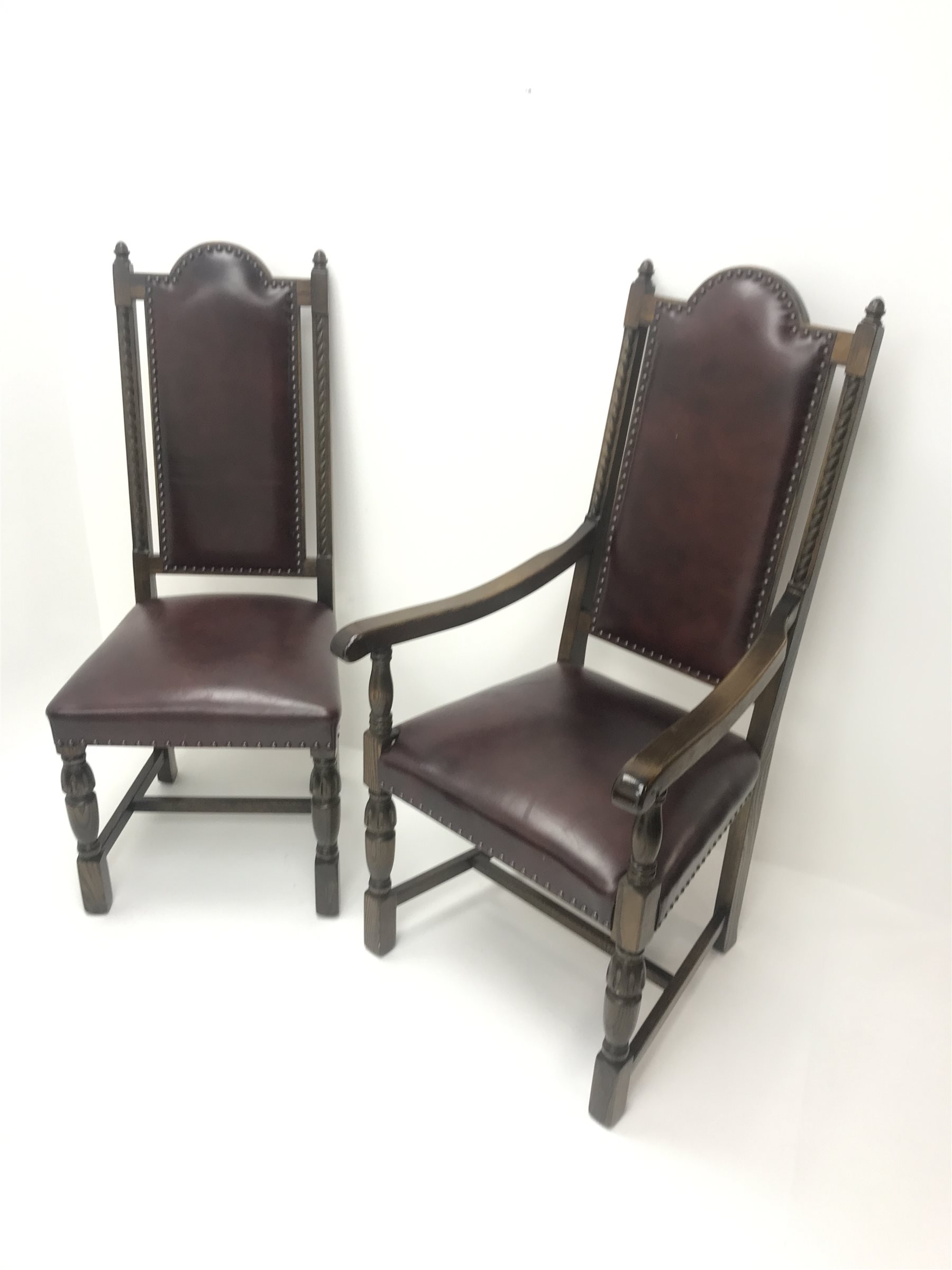  Old Charm oak drawer leaf dining table, carved cup and cover supports on shaped sledge feet joined by single stretcher (W275cm extended, 183cm closed, H76cm, D108cm) and set eight (6+2)  chairs, arched cresting rail with finials, studded leather back and seat, cup and cover supports joined by stretchers (W  