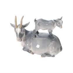 Five Royal Copenhagen figures, including Mare and Foal no.698, Goat and Kid no. 4744, Fox and Cubs no.1788