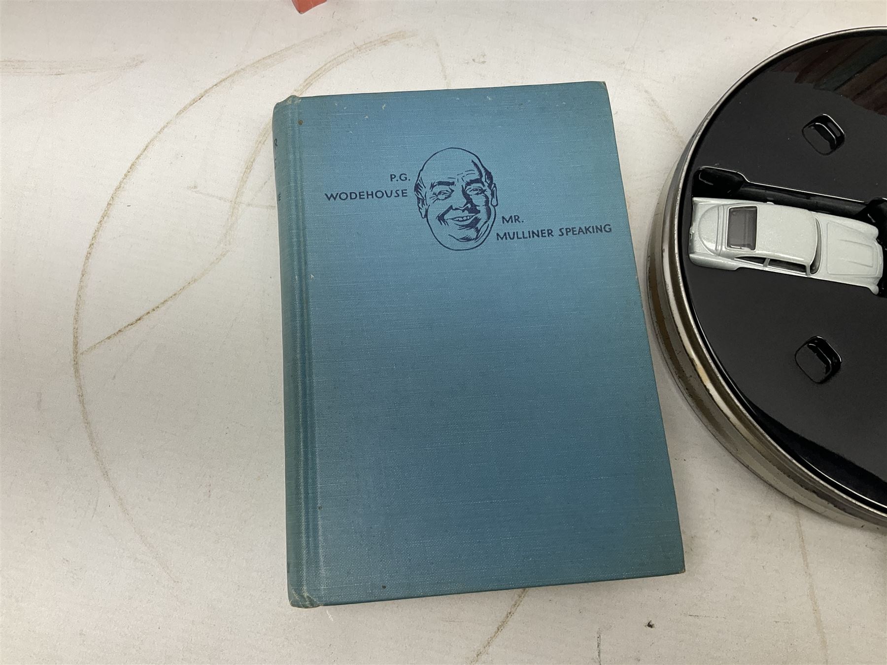 Wodehouse P.G.: Mr. Mulliner Speaking. First American edition 1930; eighteen P.G. Wodehouse paperback books; fourteen James Bond paperback books and Corgi tin of four James Bond die-cast model cars