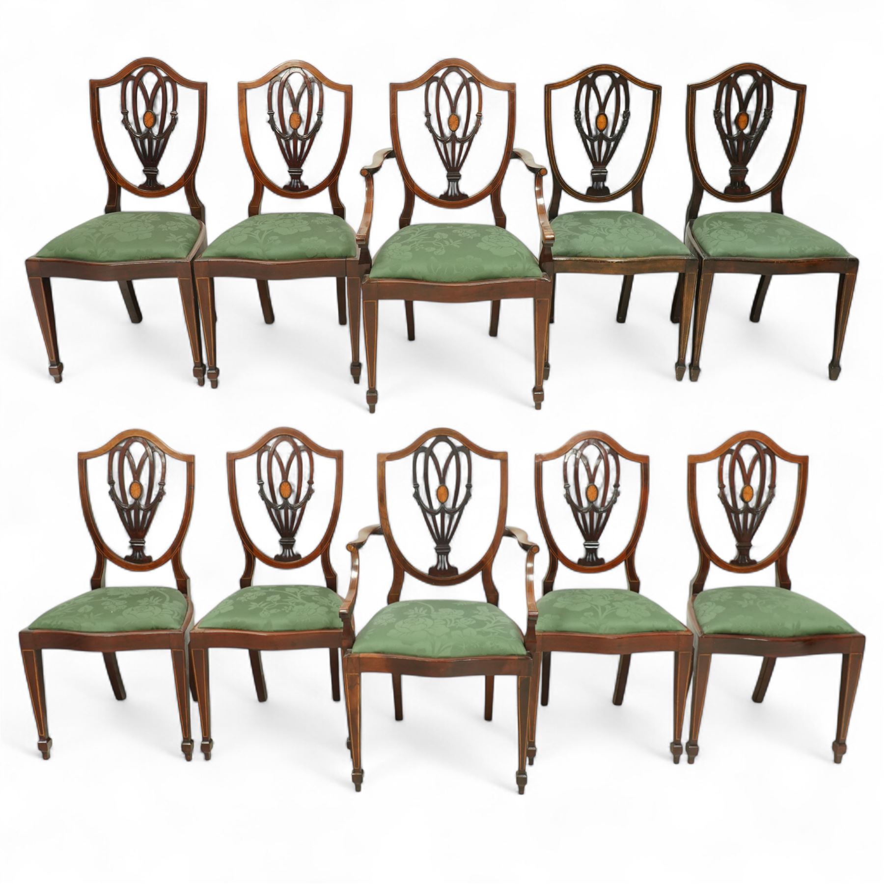 Hepplewhite design mahogany set of ten dining chairs, two carvers and eight dining chairs, with inlaid oval medallion to the vase splat, green upholstered drop-in seats, on square section tapering supports with spade feet, including two carvers