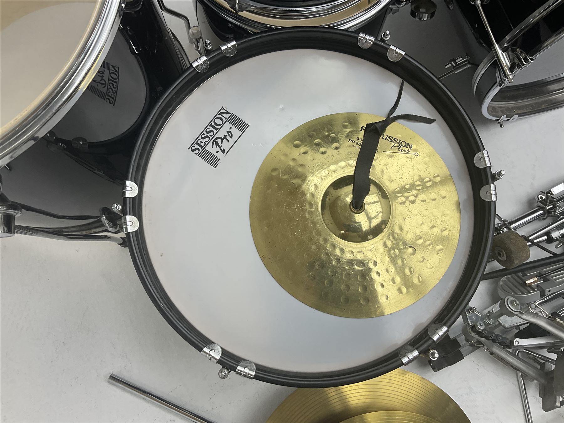 Rockburn eight-piece black drum kit with bass drum, floor tom and five other toms and snare drum; together with two other snare drums; Haosen bass drum; four cymbals; various stands, foot pedals, stool, tri-angle, drum sticks etc