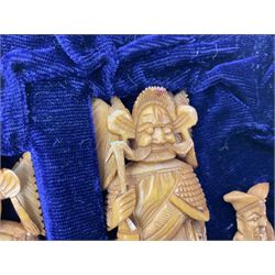Chinese resin chess set, complete with character pieces housed in a folding case, the exterior decorated as a board, L40cm