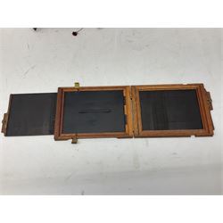 Thornton Pickard Imperial Triple folding plate camera in mahogany and lacquered brass, field model, three mahogany photographic plates and a wooden tripod