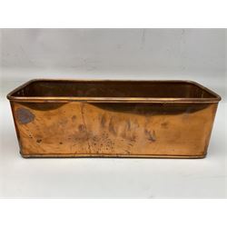 Victorian copper hot water urn, the body of plain cylindrical form with brass tap, the slightly domed lid with brass finial, together with a rectangular copper planter, with twin brass lion mask handles, urn H35cm