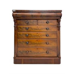19th century flame mahogany Scotch chest, frieze long drawer above two short and four long graduating drawers, with turned knobs scrolled carved side bracket 