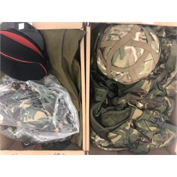  Modern British army helmet with MTP cover, female No.2 dress peaked cap, MTP day sack and bergen covers, operational waistcoat, two pairs Combat 95 style trousers and military cape  