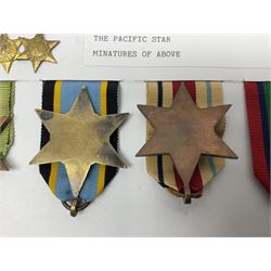 Representative display of WWII Campaign stars comprising 1939-1945 Star, Atlantic Star, Air-Crew Europe Star, Africa Star and Pacific Star; together with the corresponding group of miniatures; all with ribbons