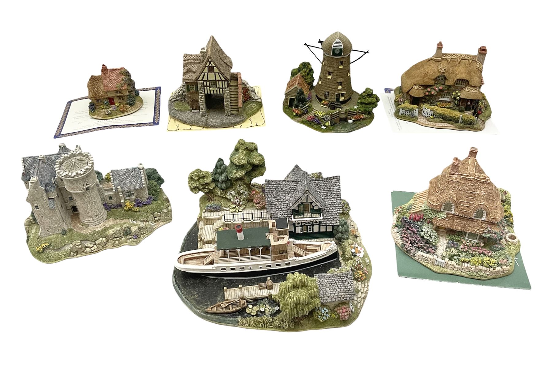 Seven Lilliput Lane cottages, comprising five limited edition examples, one French collection example and one Dutch collection, to include Queen of Windemere, Penkill Castle and Gertrude's Garden, all with boxes, four with deeds