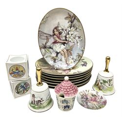 Royal Worcester Flower Fairies oval collectors plates, Goebel mustard pot, two Danbury Mint Fairy Tale bells, and pair of Hutschenreuther candlesticks decorated with scenes of Puss in Boots