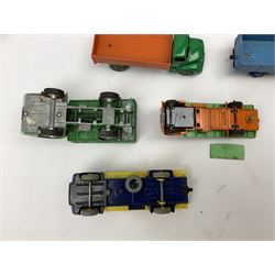 Dinky - seven unboxed and playworn/repainted die-cast commercial vehicles comprising Bedford Articulated lorry, Leyland Comet, Big Bedford, Ford 800 tipper truck, Guy flatbed and planked flatbed lorries and Dodge tipper truck (7)