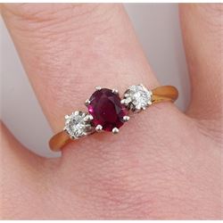 Gold three stone oval ruby and diamond ring, stamped 18ct, ruby approx 0.55 carat