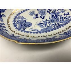 Early 19th century Spode dessert set, circa 1805-1830, blue and white transfer printed in the Grasshopper pattern, comprising comport of oblong form with twin naturalistically modelled branch handles, two oval dishes, and six plates, each with blue or green printed mark beneath, including handles comport H11.5cm W34cm, oval dishes W26.5cm, plates D20.5cm