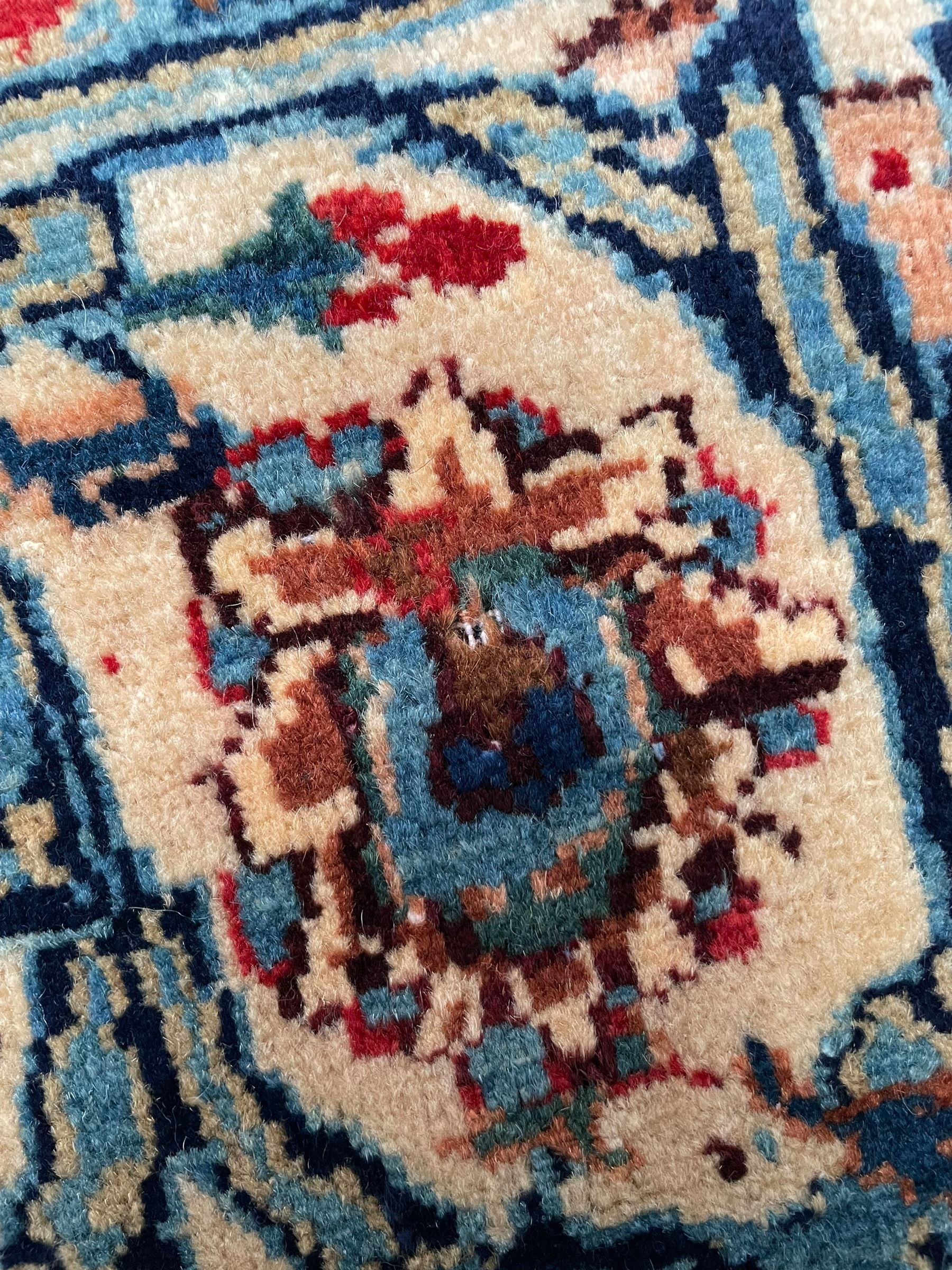 Persian Kashmar camel ground carpet, palmette rosette medallion on a field of curling leafy branches and stylised plant motifs, scrolling border decorated with further palmettes, within floral pattern guard stripes