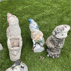 Eight cast stone miniature garden gnomes  - THIS LOT IS TO BE COLLECTED BY APPOINTMENT FROM DUGGLEBY STORAGE, GREAT HILL, EASTFIELD, SCARBOROUGH, YO11 3TX