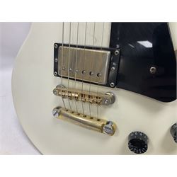 2010 Gibson Les Paul studio guitar, serial no101500537 in white finish with gold and pale green hardware, in Auden soft carry case, guitar L100cm