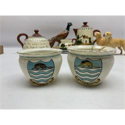 Beswick pheasant, no 1774, together with two Beswick dogs, W.H. Goss Beverley crested ware teacups and Royal Watoombe Torquay motto ware Land's End three piece miniature tea service
