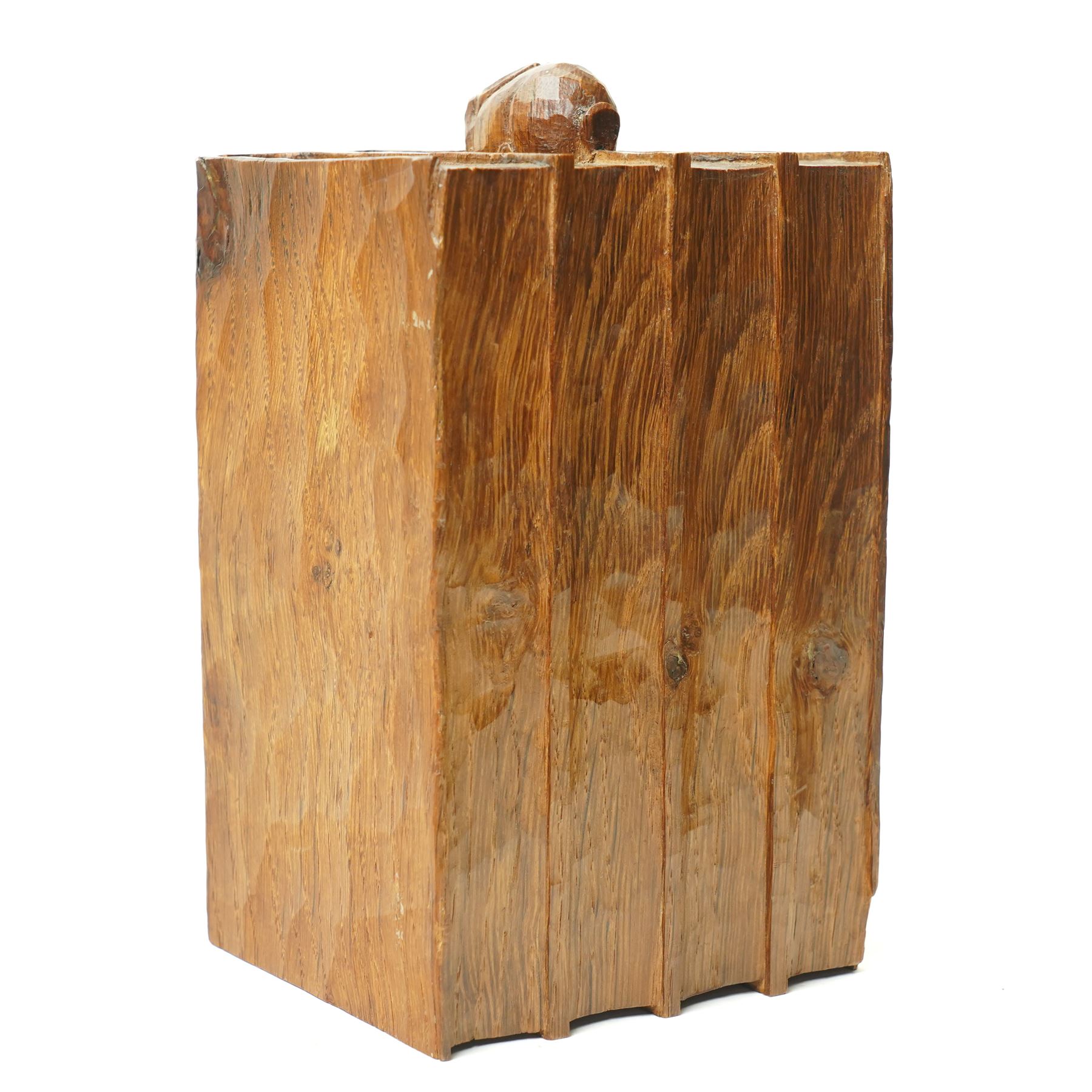 Rabbitman - pair of adzed oak bookends, each carved as a set of four books, with carved rabbit signature, by Peter Heap of Wetwang