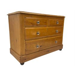 Victorian waxed pine chest, fitted with two short over two long drawers, each with glass handles
