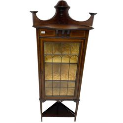 Edwardian inlaid mahogany corner cabinet, fitted with single astragal glazed door enclosing two shelves, flanked by satinwood banding, on square tapering supports united by undertier