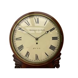A single fusee 8-day drop dial mahogany cased wall clock, c1860 with a 14-1/2” wooden bezel and 12” painted convex dial, cast brass bezel and convex glass, dial with retailer's name “Bedell & Son, Hull”, Roman numerals, minute track and matching steel moon hands, with a recoil anchor escapement and rectangular movement plates, case with scroll carved ears and glazed pendulum aperture, pendulum location door and a pendulum regulation door to the curved base. With pendulum.
***Peter and Benjamin Bedell were a family of 19th century Hull clockmakers working from various locations in Hull between 1823 and 1872.
