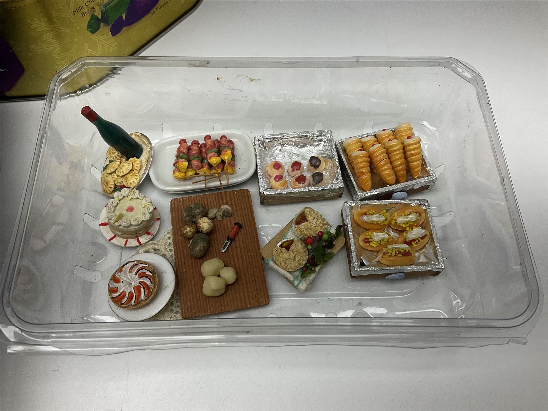 Collection of miniature dolls house pub accessories including wine bottles and glasses, together with miniature dolls house cafe food and accessories, plates, vases and wired and non-wired lighting including table lamps and ceiling lights 