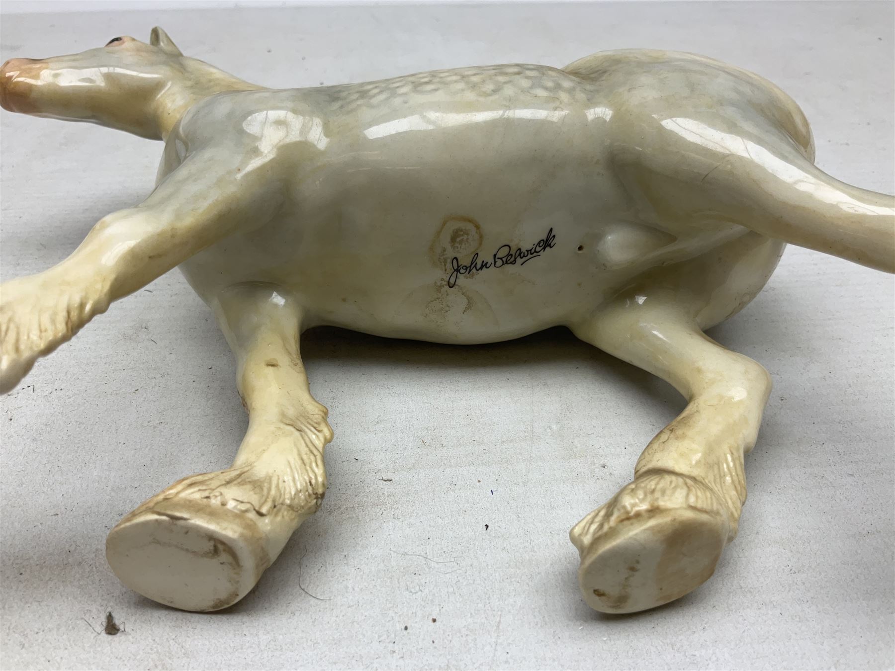 Group of three Beswick Shire horses, comprising CH. Burnham Beauty mare in matte finish, dapple grey horse and bay horse, all with stamped marks beneath