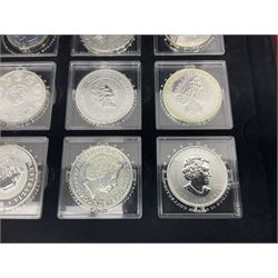 'The 2012 Fabulous 12 Silver Coin Collection' including Queen Elizabeth II Britannia one ounce silver two pound coin, Queen Elizabeth II Canada Maple Leaf one ounce silver five dollar coin, Queen Elizabeth II Australian Koala one ounce silver one dollar coin, Austrian Philharmonic one and a half euro coin, etc., in wooden presentation case