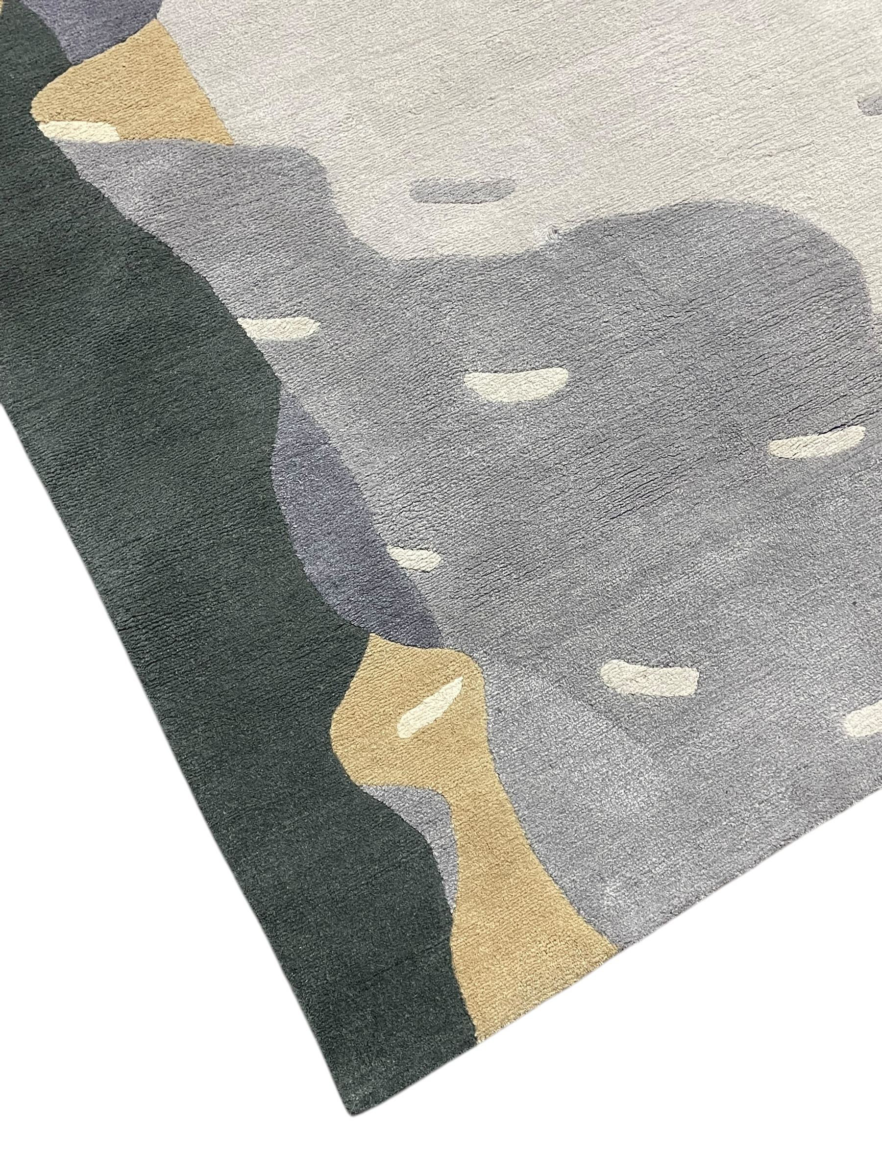 Deirdre Dyson London - 'Birch Tree' abstract rug, shades of grey and green depicting a birch trunk 