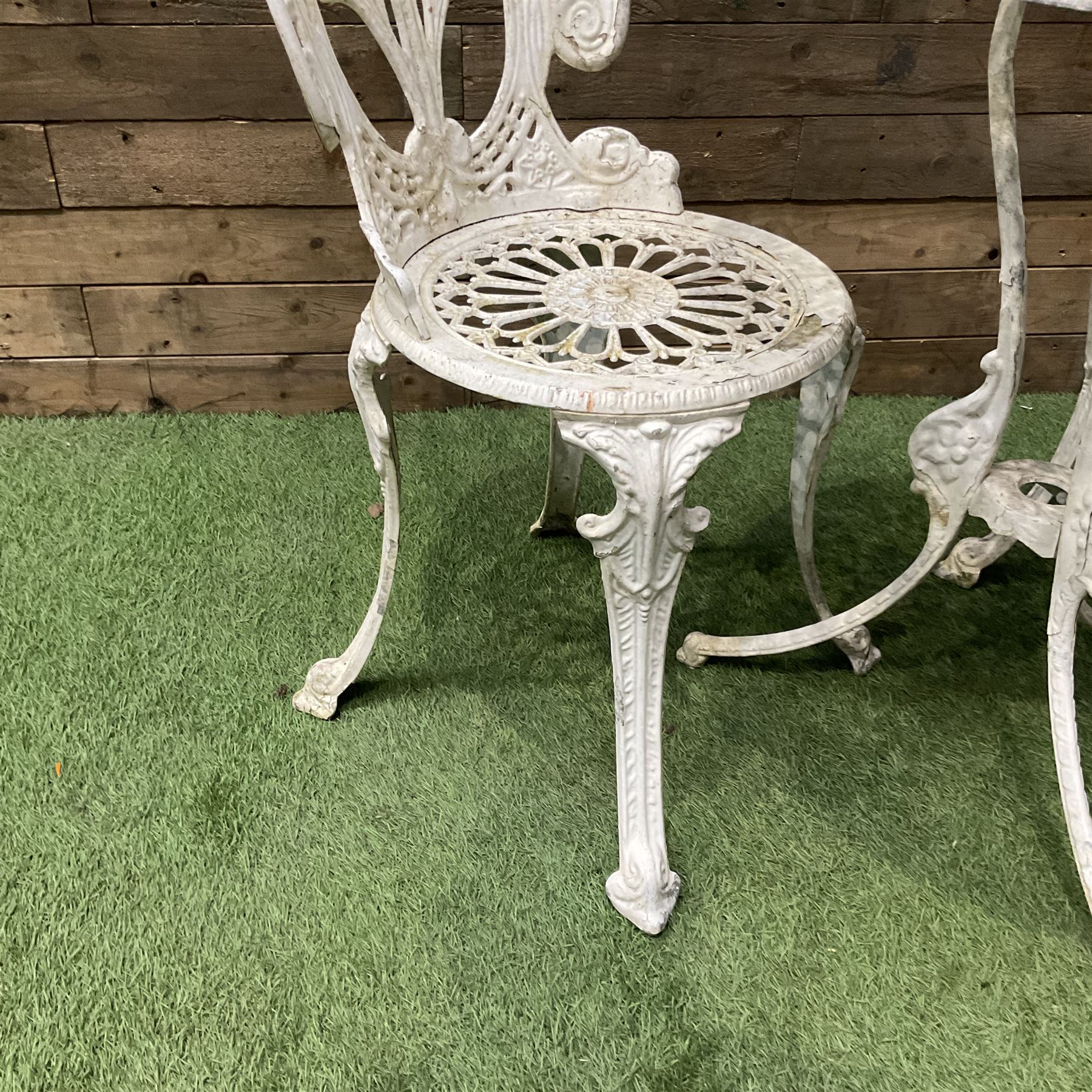Cast aluminium circular garden table and two chairs - THIS LOT IS TO BE COLLECTED BY APPOINTMENT FROM DUGGLEBY STORAGE, GREAT HILL, EASTFIELD, SCARBOROUGH, YO11 3TX