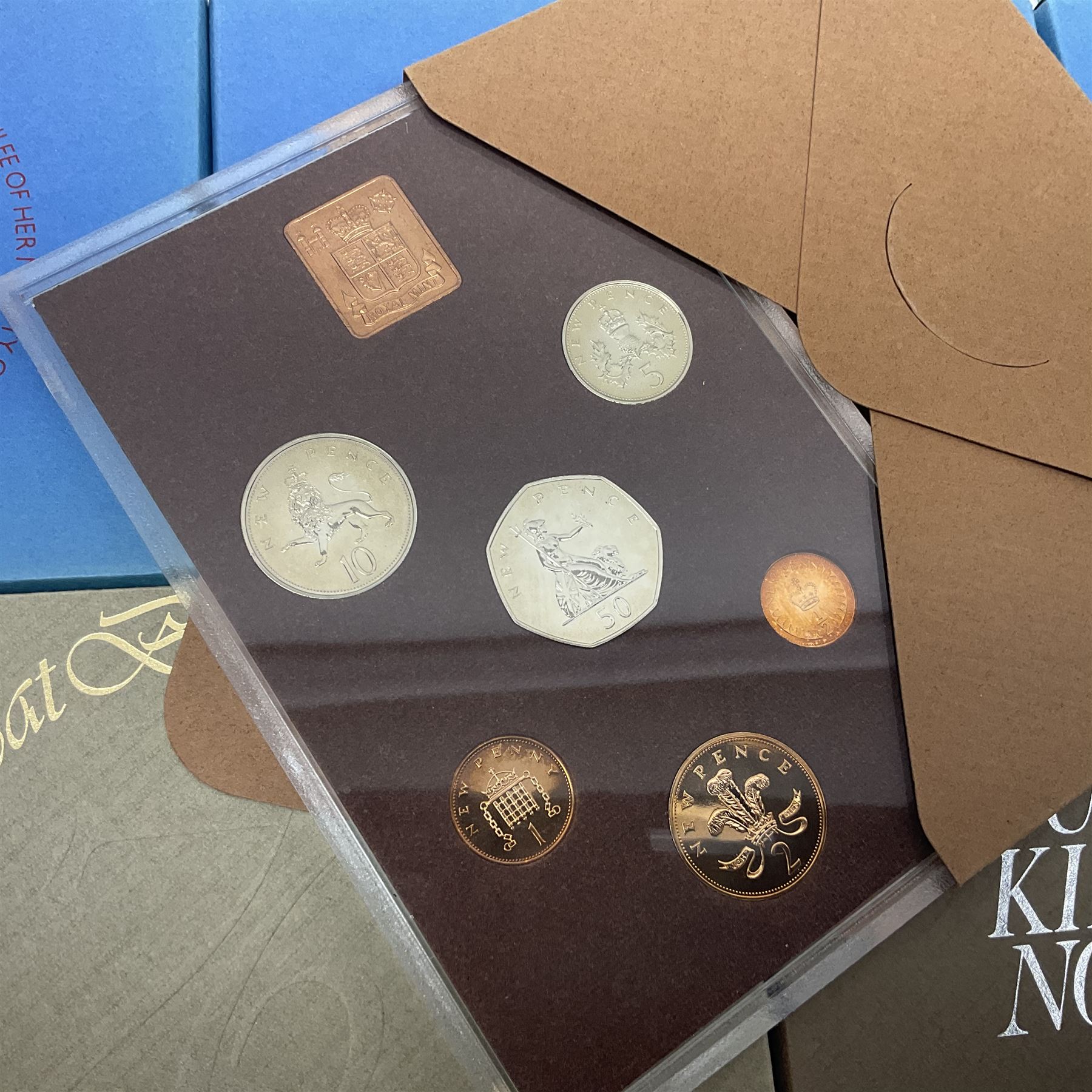Eleven Great British coin year sets, dated two 1970, 1972, 1973, 1974, 1975, 1976, three 1977 and 1978, all in plastic displays with card covers