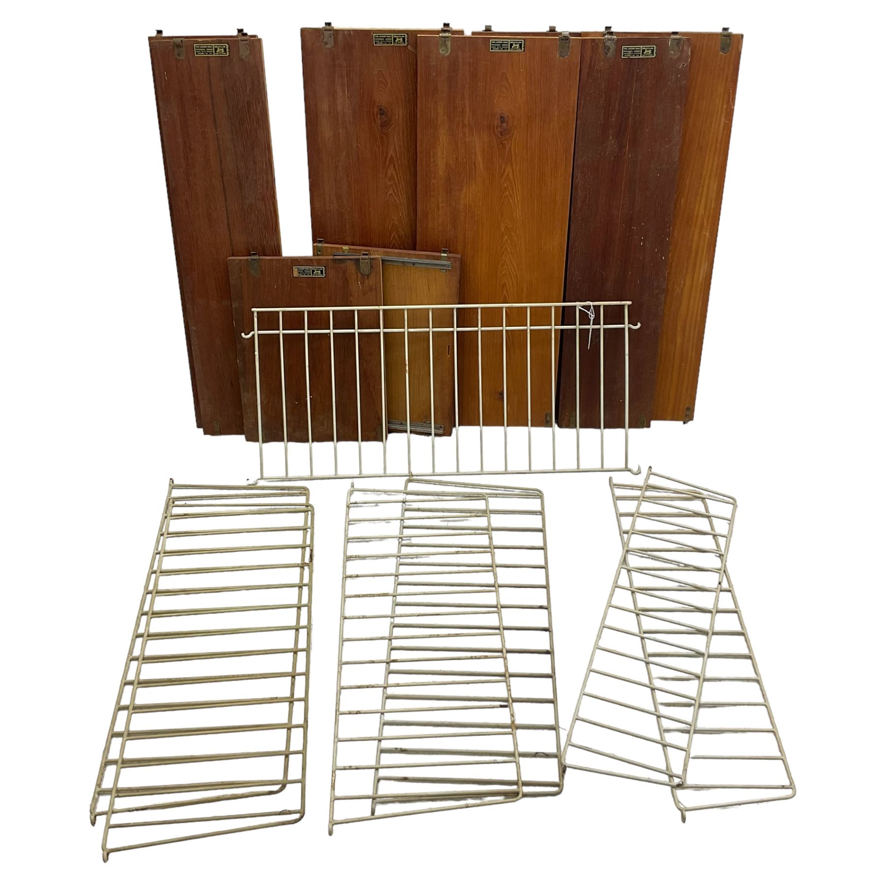 BFB-HYLLAN - collection of 'String' 1950s/60s teak wall shelving - four deep ladders (77cm x 28cm); two narrow ladders (78cm x 18cm); various shelves 