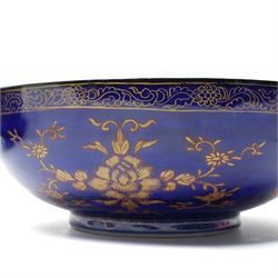 Pair of 19th century Samson of Paris bowl decorated in gilt with flowers and trailing leaves on a dark blue ground, the interior of one with a Japanese flower and the other with a floral spray D26cm 
Provenance: property of a Nobleman
