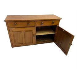JAS Brister & Co Ld - Mid-20th century teak sideboard, fitted with two drawers over two panelled cupboards, stamped 'JAS. Brister & Co Ltd., Complete House Furniture, Port Elizabeth'